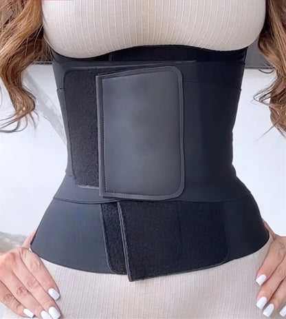 a woman wearing a black waist trainer belt