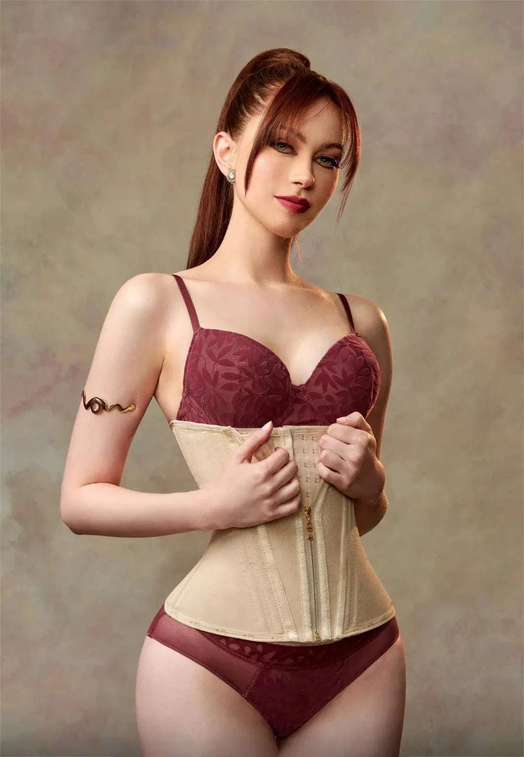 a woman wearing a beige Enviable Beauty fajas colombianas strapless waist trainer and panties