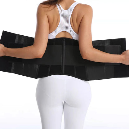 a woman wearing a white bra with a black waist trainer belt around her waist