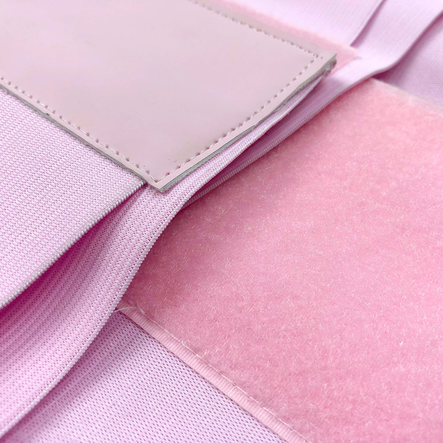 a close up of a pink waist trainer belt