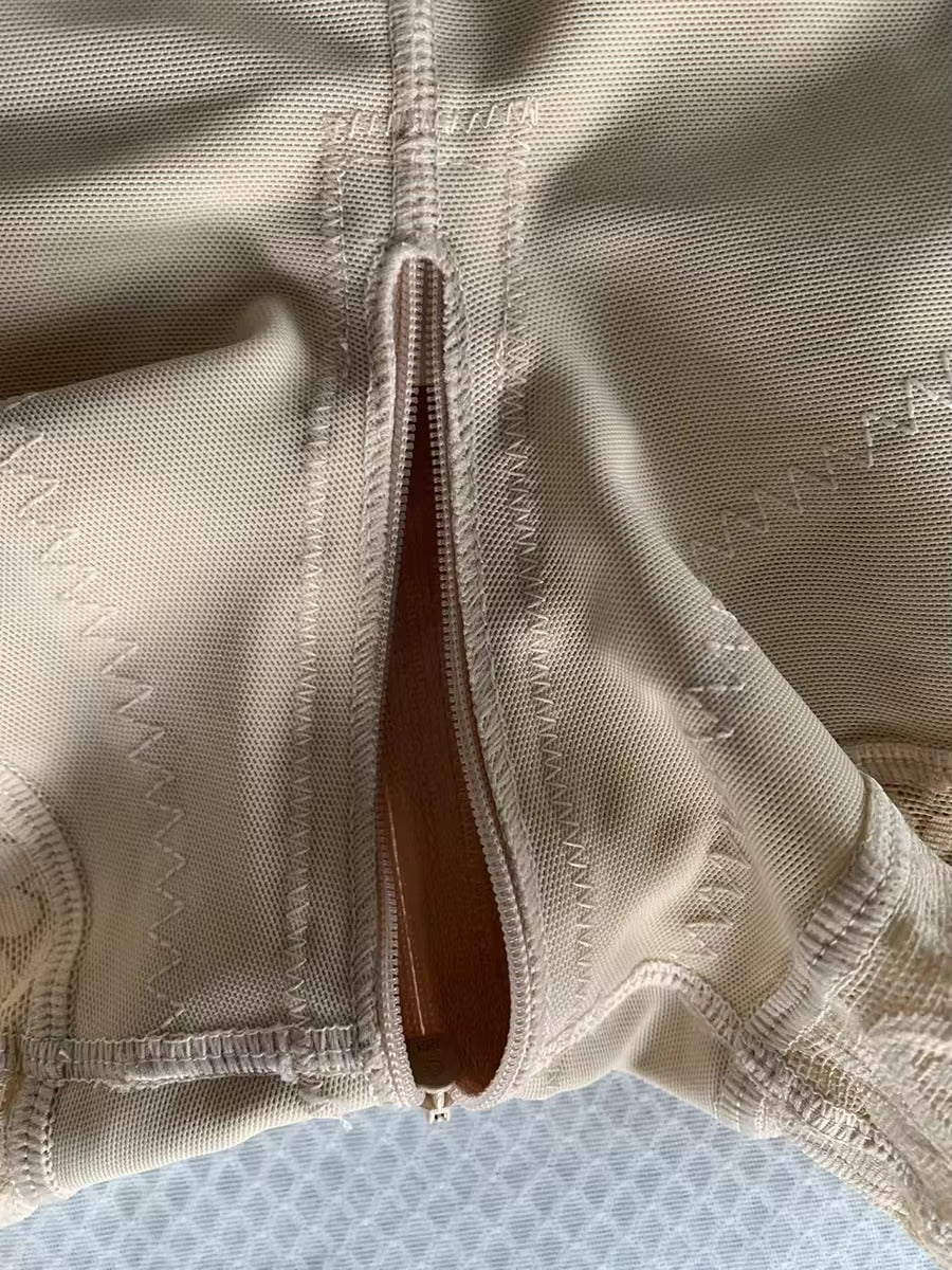 a close up of a butt lifter postpartum girdle bbl bodysuit with open crotch with a zipper for easy bathroom use