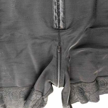 a close up of a Butt Lifter Postpartum Girdle BBL Underbust Bodysuit on a white background