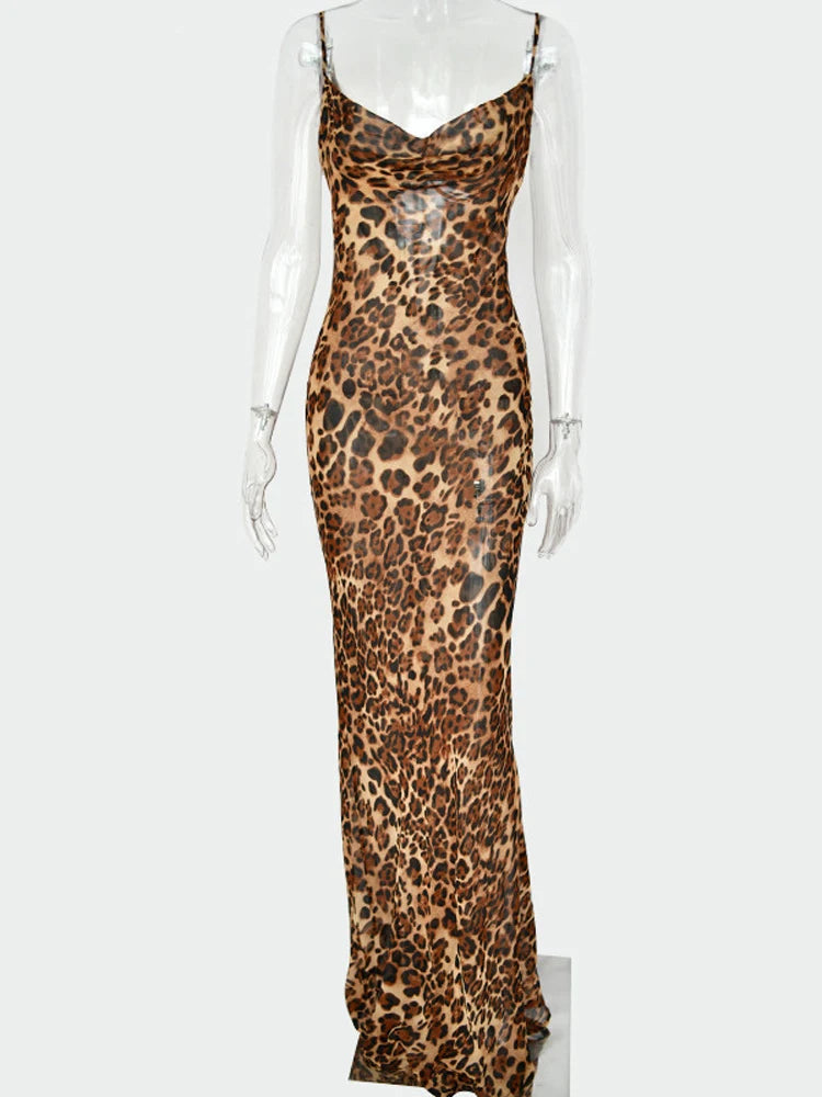 a mannequin wearing a leopard print dress